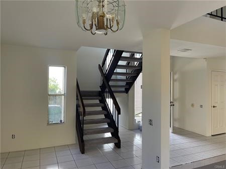 8 Marsh Hawk Irvine, CA 92604 - Photo 3 of 13 a view of entryway with stairs