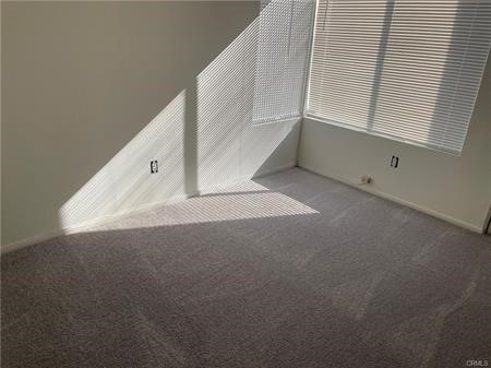 8 Marsh Hawk Irvine, CA 92604 - Photo 6 of 13 a view of an empty room with windows