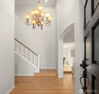 a view of entryway with wooden floor