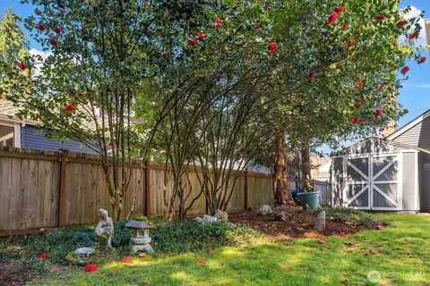 a backyard of a house with lots of green space