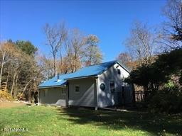 320 East River Road Chester, MA 01011 - Photo 2 of 34 a view of house with backyard