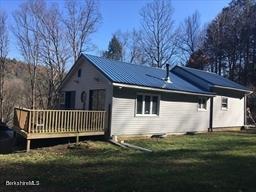 320 East River Road Chester, MA 01011 - Photo 3 of 34 a view of a house with a yard