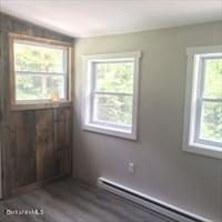 320 East River Road Chester, MA 01011 - Photo 21 of 34 an empty room with a window