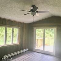 320 East River Road Chester, MA 01011 - Photo 22 of 34 a view of an empty room with a window