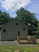 320 East River Road Chester, MA 01011 - Photo 4 of 34 a view of a house with a yard