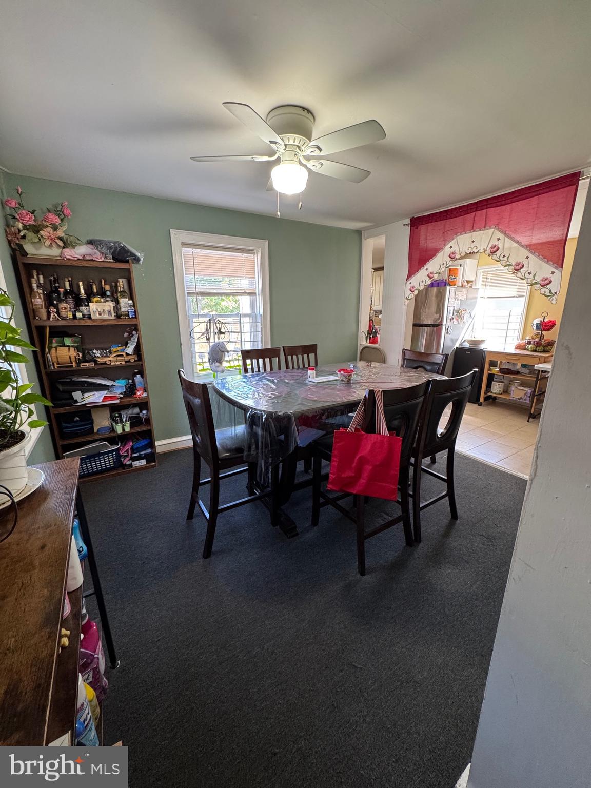 1515 Collings Road Camden, NJ 08104 - Photo 8 of 23 a living room with furniture a rug and a chandelier