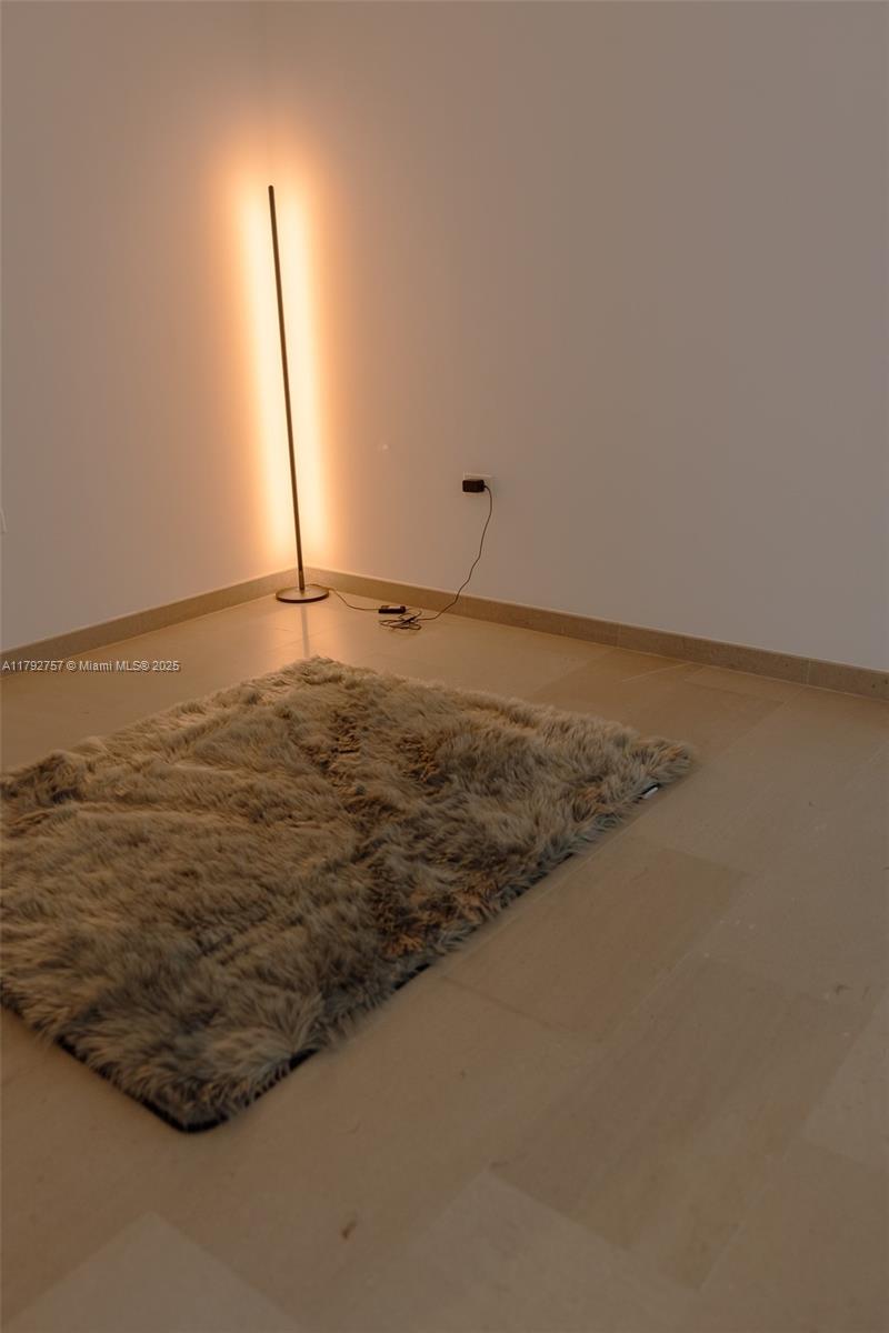 68 Southeast 6th Street, Unit 1204 Miami, FL 33131 - Photo 25 of 48 a view of a room with an empty space