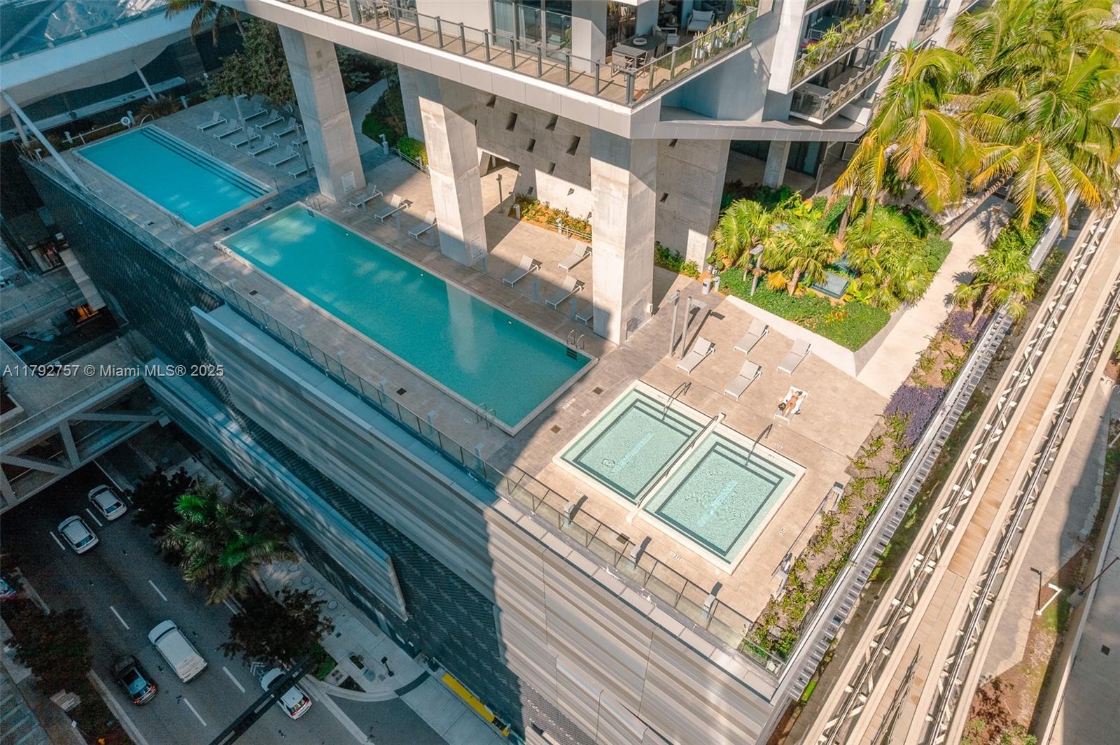 68 Southeast 6th Street, Unit 1204 Miami, FL 33131 - Photo 36 of 48 a view of a balcony with wooden floor
