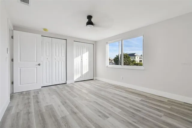 a view of a bathroom from a hallway
