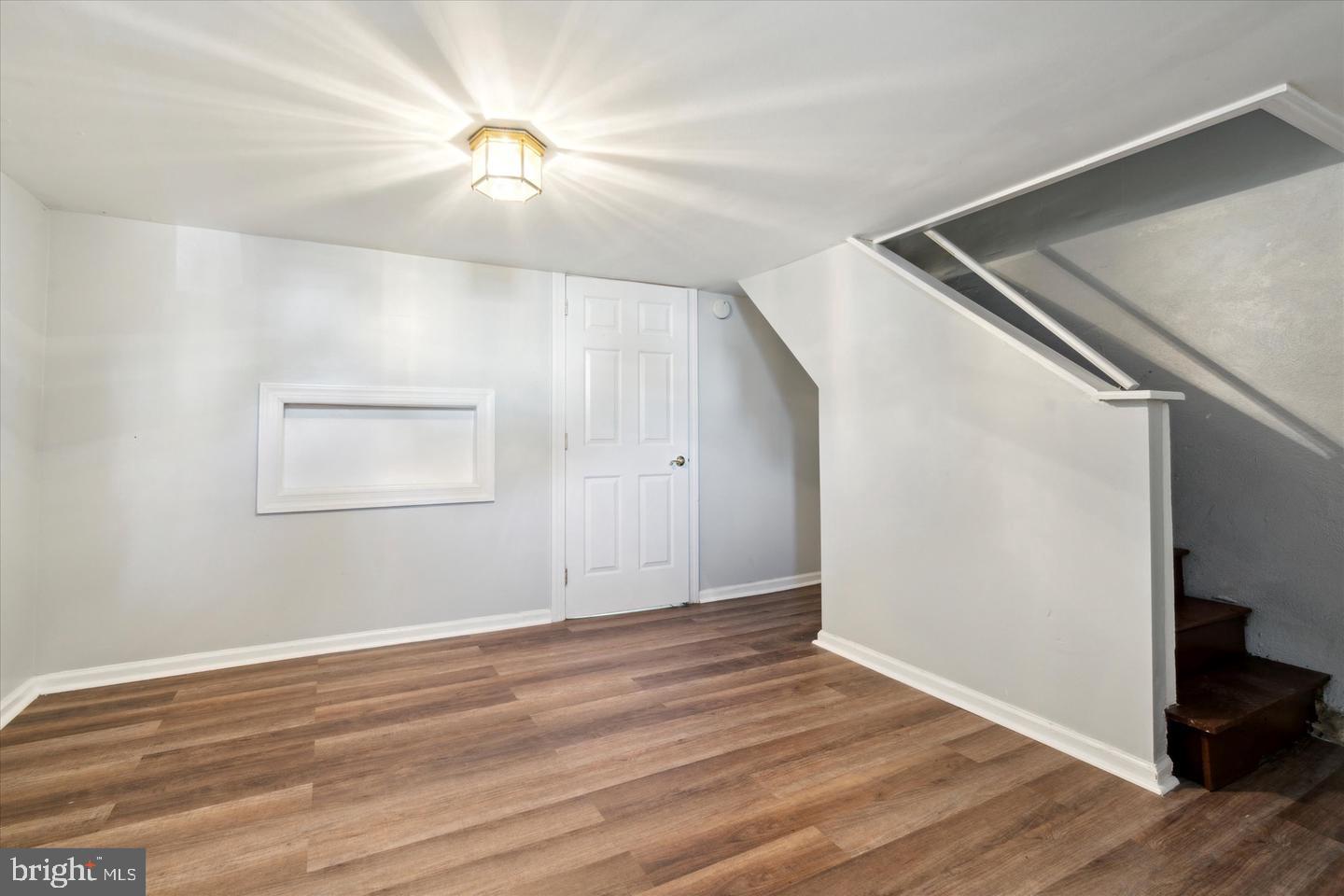 620 MacDade Boulevard Darby, PA 19023 - Photo 16 of 23 a view of an empty room with wooden floor