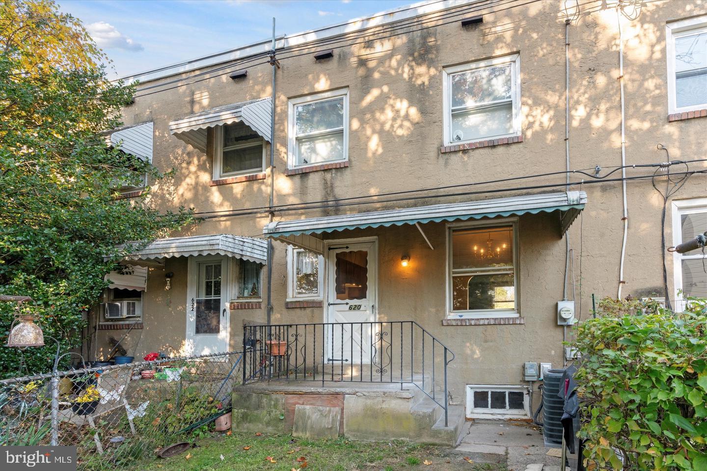 620 MacDade Boulevard Darby, PA 19023 - Photo 20 of 23 a front view of a house with a yard