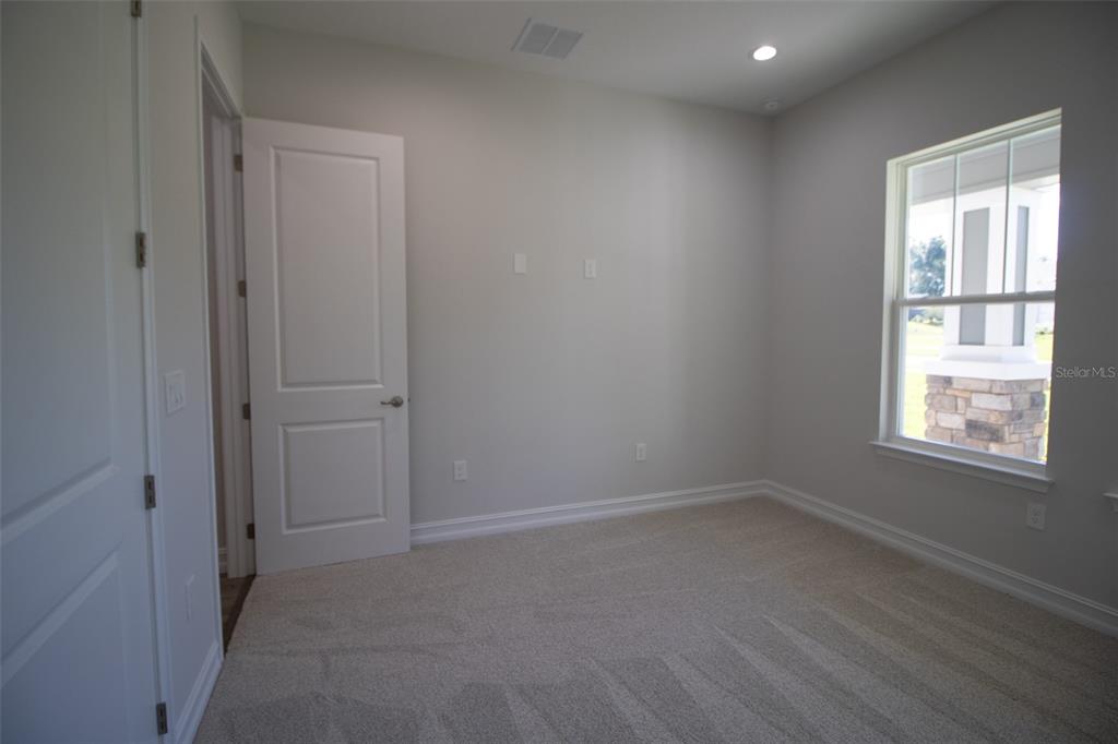 6671 Summit View Drive Brooksville, FL 34601 - Photo 23 of 37 an empty room with a window
