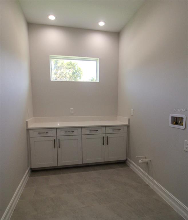 6671 Summit View Drive Brooksville, FL 34601 - Photo 28 of 37 a room with cabinets