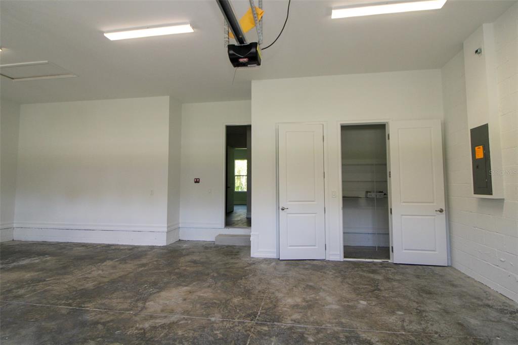 6671 Summit View Drive Brooksville, FL 34601 - Photo 30 of 37 an empty room with a door