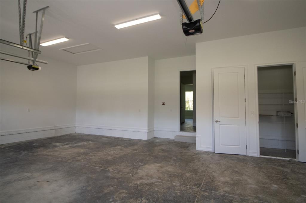 6671 Summit View Drive Brooksville, FL 34601 - Photo 31 of 37 an empty room with fan