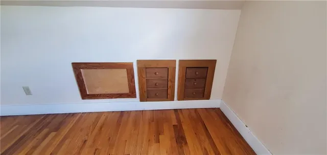 a bathroom with a sink a toilet and shower curtain