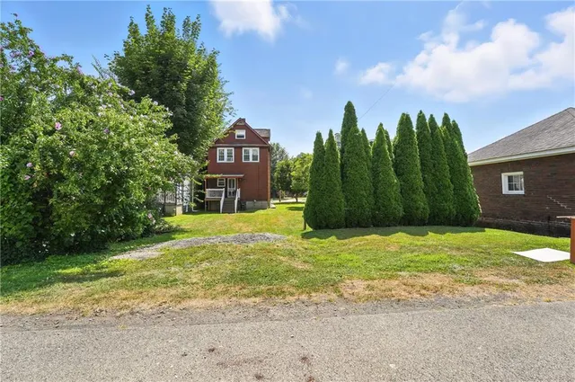a view of a big room with air conditioner duct and materials on floor