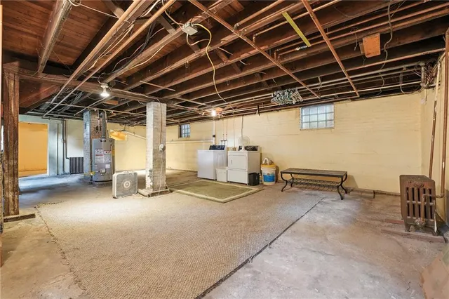 an aerial view of multiple houses with a yard