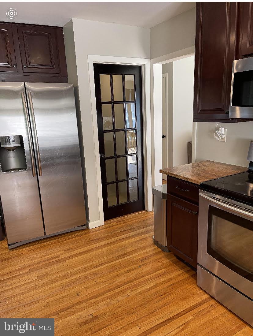 814 Ridge Lane Media, PA 19063 - Photo 33 of 51 Kitchen's glass door to see the lower level