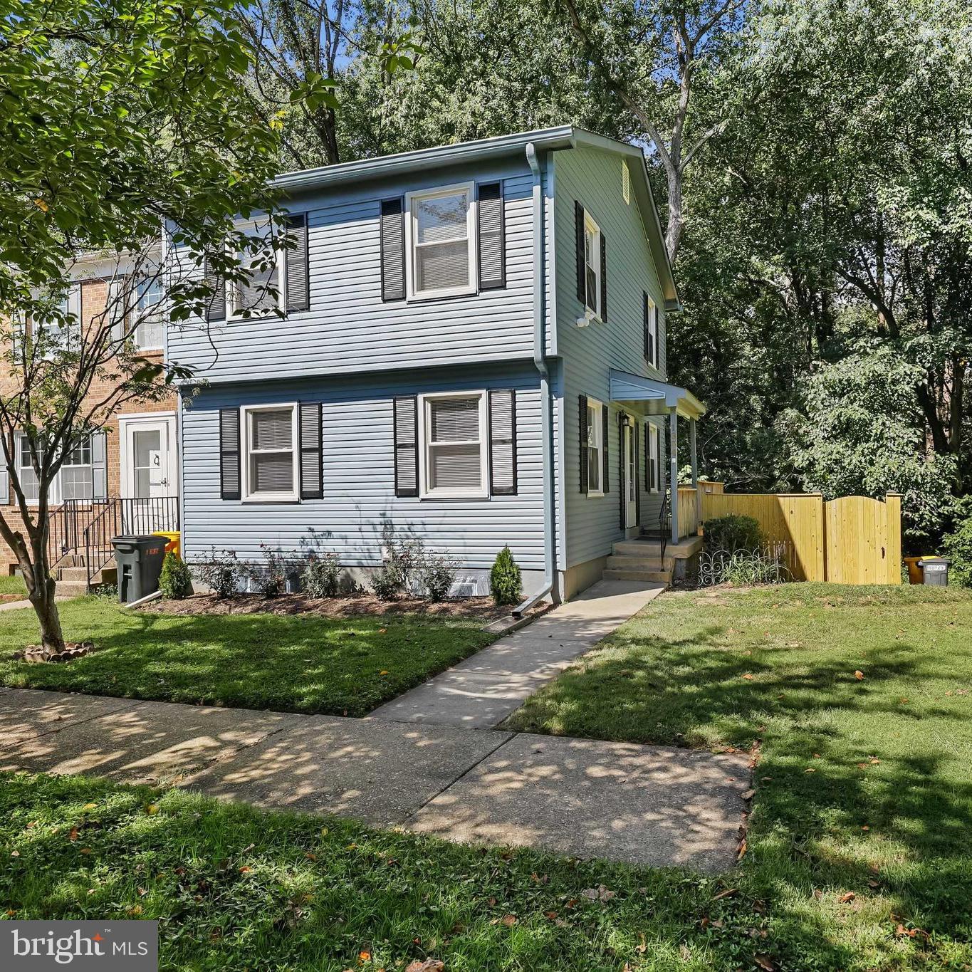 1634 Mt Airy Court Crofton, MD 21114 - Photo 1 of 40 a front view of a house with a yard