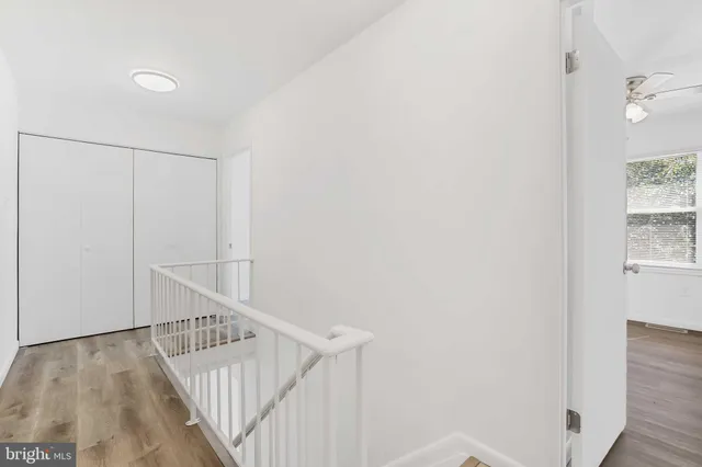 a view of entryway with wooden floor