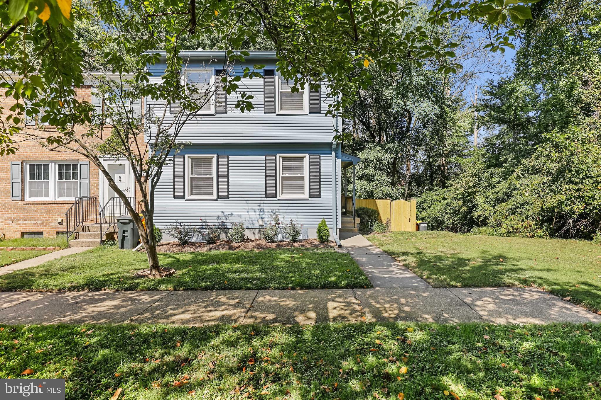 1634 Mt Airy Court Crofton, MD 21114 - Photo 2 of 40 a front view of a house with a yard
