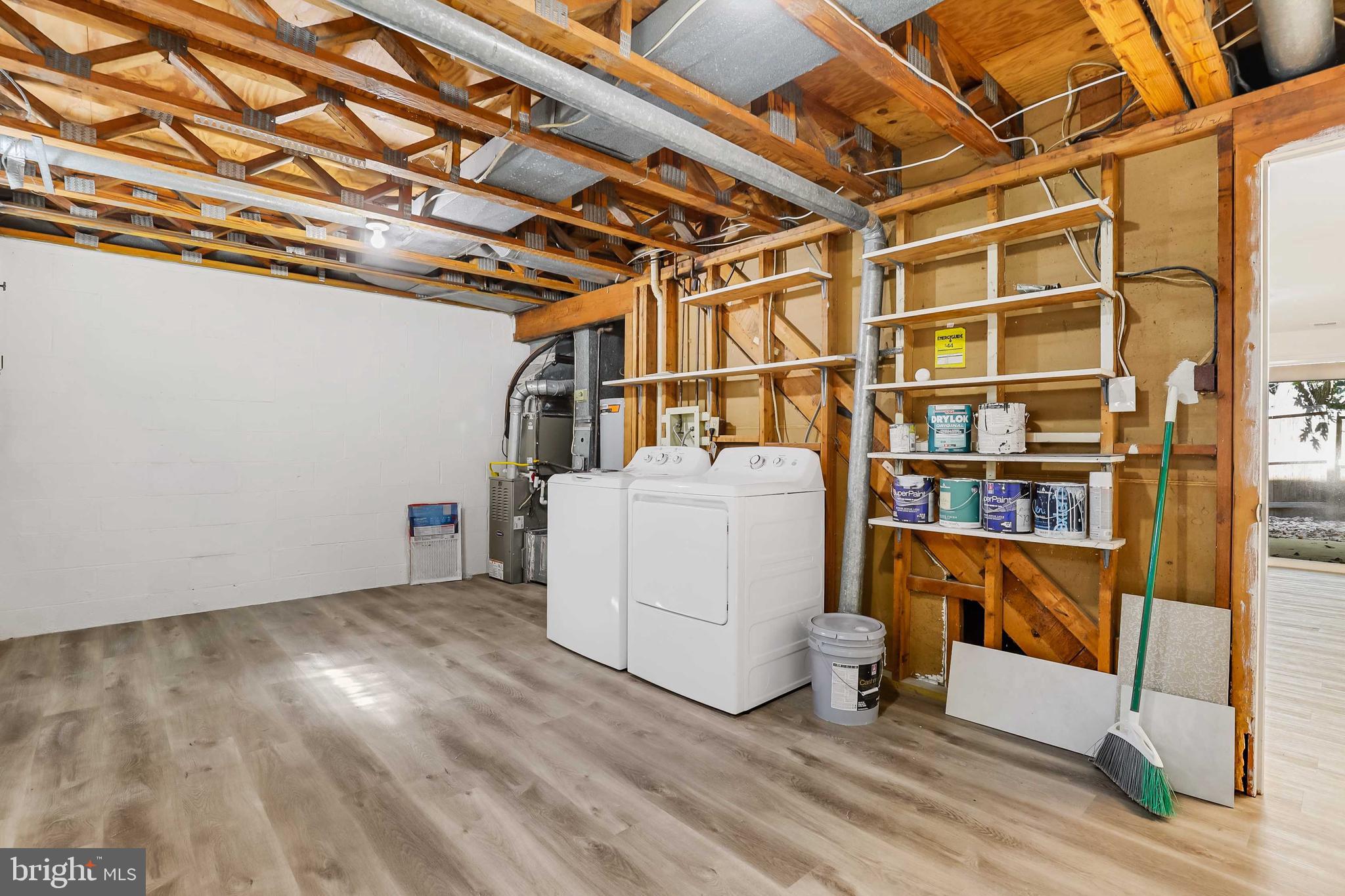 1634 Mt Airy Court Crofton, MD 21114 - Photo 32 of 40 a utility room with dryer and washer