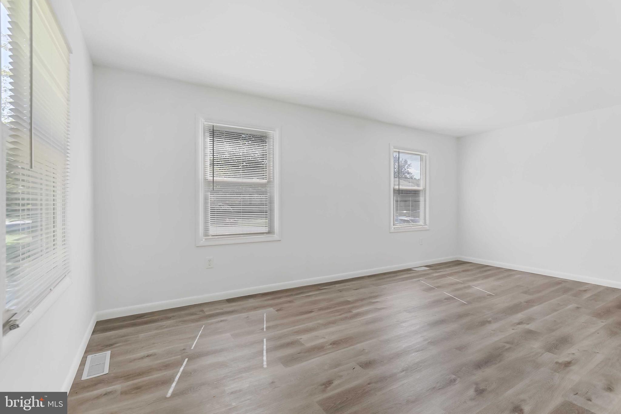 1634 Mt Airy Court Crofton, MD 21114 - Photo 5 of 40 an empty room with windows