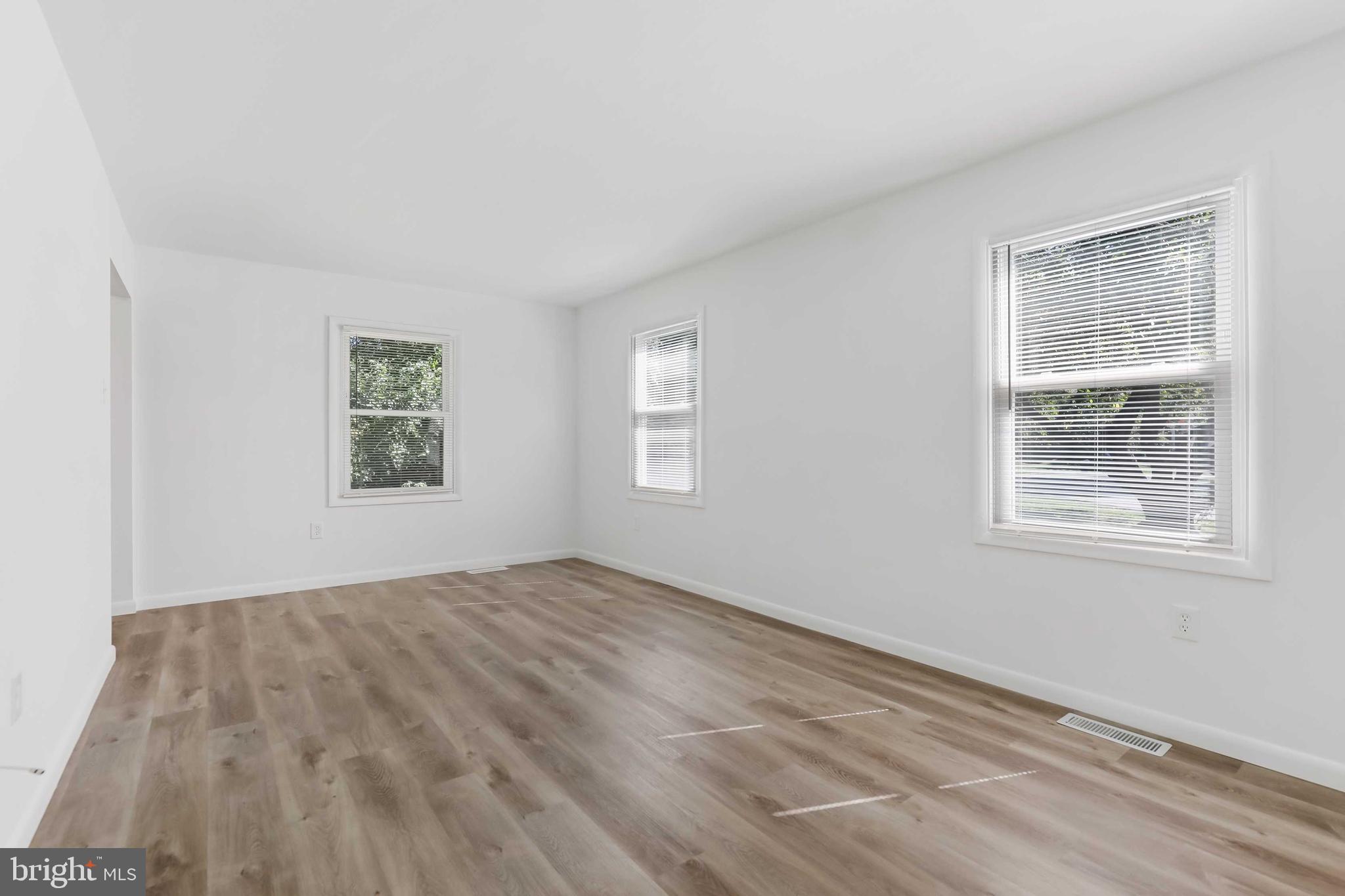 1634 Mt Airy Court Crofton, MD 21114 - Photo 7 of 40 a view of an empty room with a window