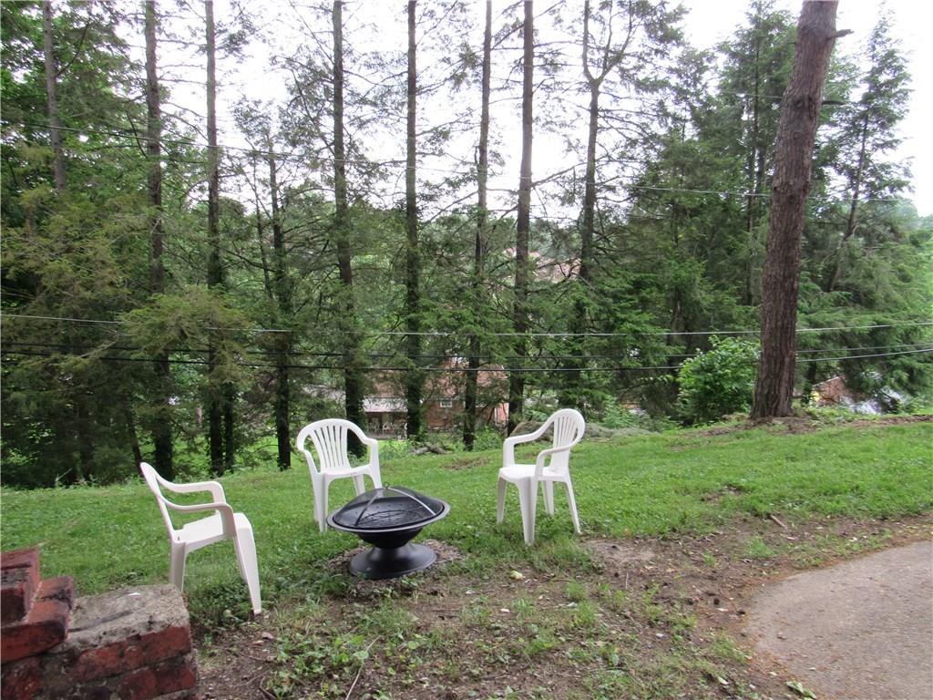 4741 Doyle Road Pittsburgh, PA 15227 - Photo 19 of 22 Serene back yard with fire pit. Enjoy long evenings by the fire