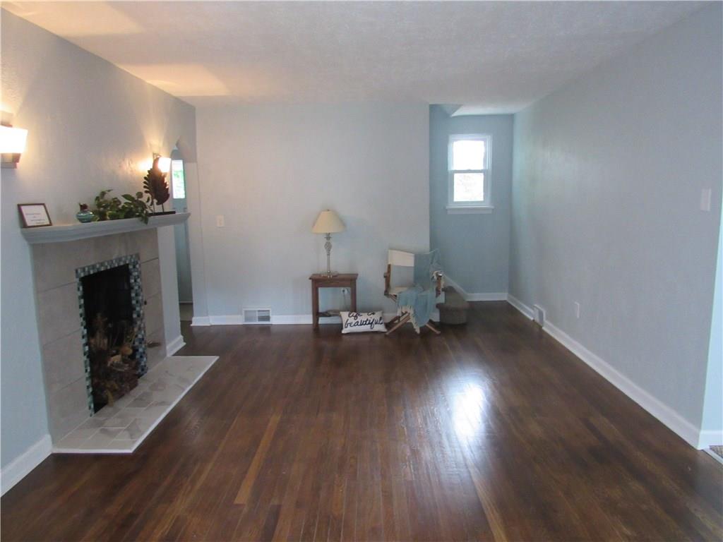4741 Doyle Road Pittsburgh, PA 15227 - Photo 3 of 22 Stunning brand new fire place and restored original hard wood floors