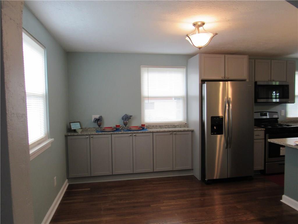4741 Doyle Road Pittsburgh, PA 15227 - Photo 7 of 22 Gleaming original hard wood floors though out the dining room and kitchen.