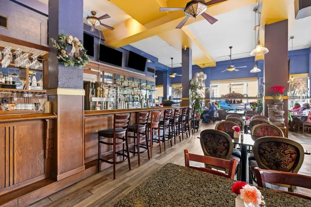 a outdoor space with lots of tables and chairs