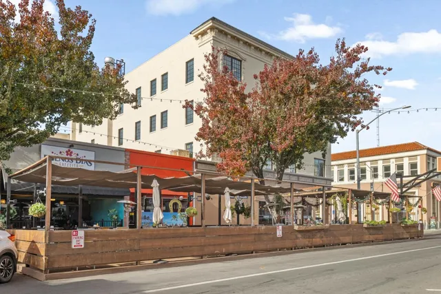 a view of a building and a people