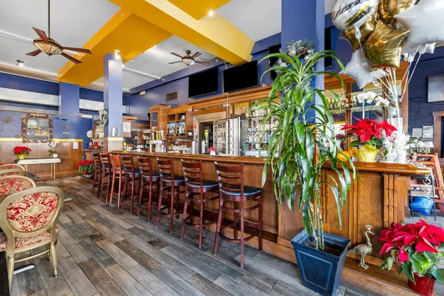 a view of a chairs and tables in patio