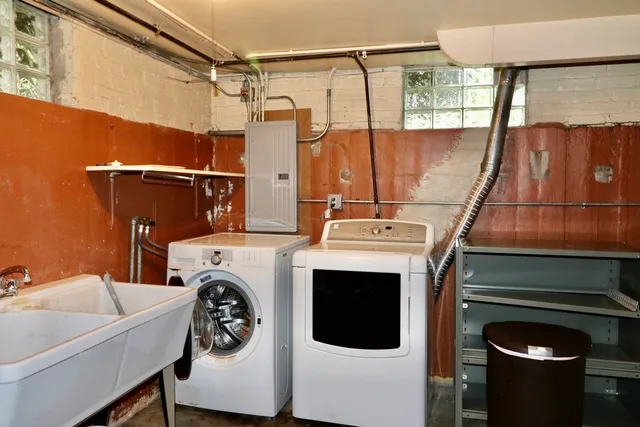 a utility room with dryer and washer