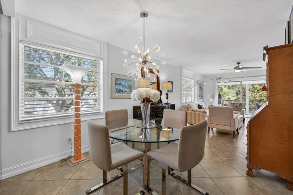 a view of a kitchen and dining room