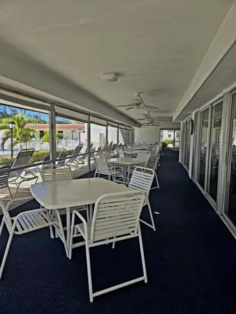 a view of a pool and outdoor space