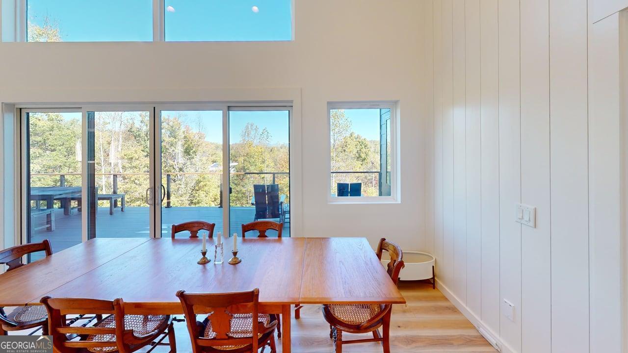 458 Brannon Ridge Young Harris, GA 30582 - Photo 13 of 34 a view of a dining room with furniture and wooden floor