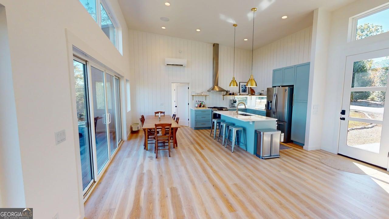 458 Brannon Ridge Young Harris, GA 30582 - Photo 15 of 34 a dining room with furniture and a kitchen view