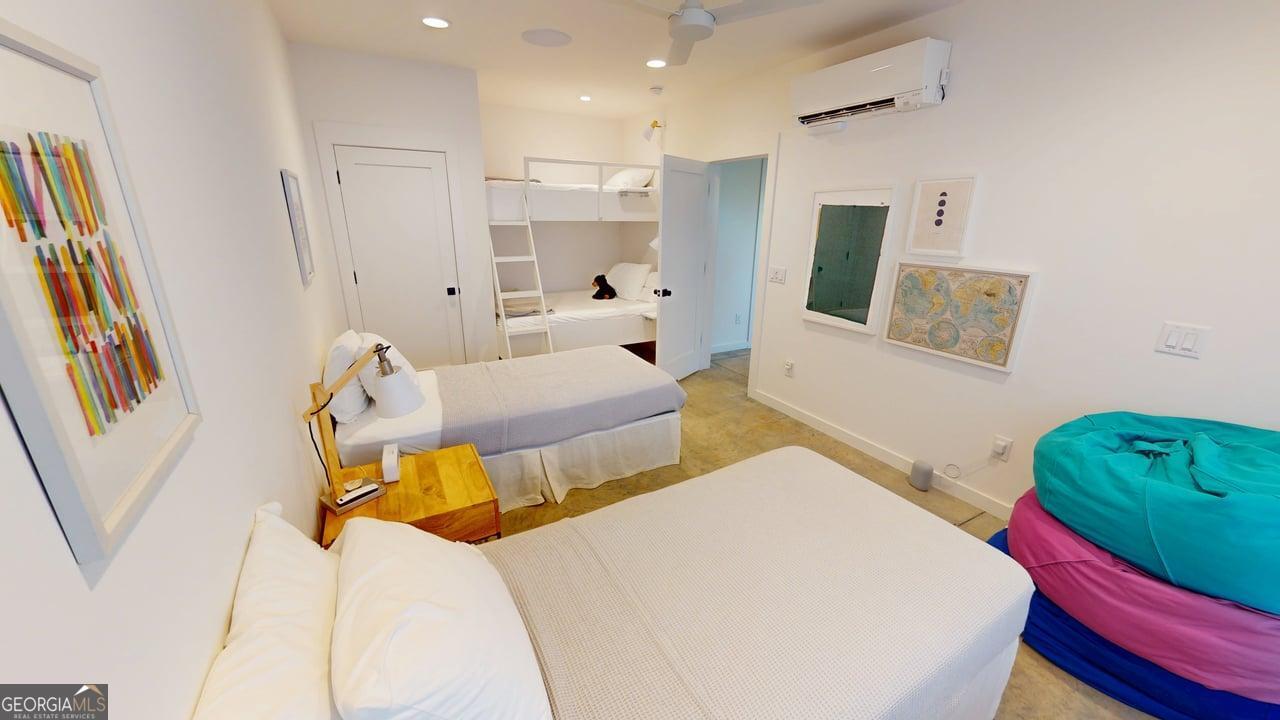 458 Brannon Ridge Young Harris, GA 30582 - Photo 18 of 34 a bedroom with two bed and a mirror