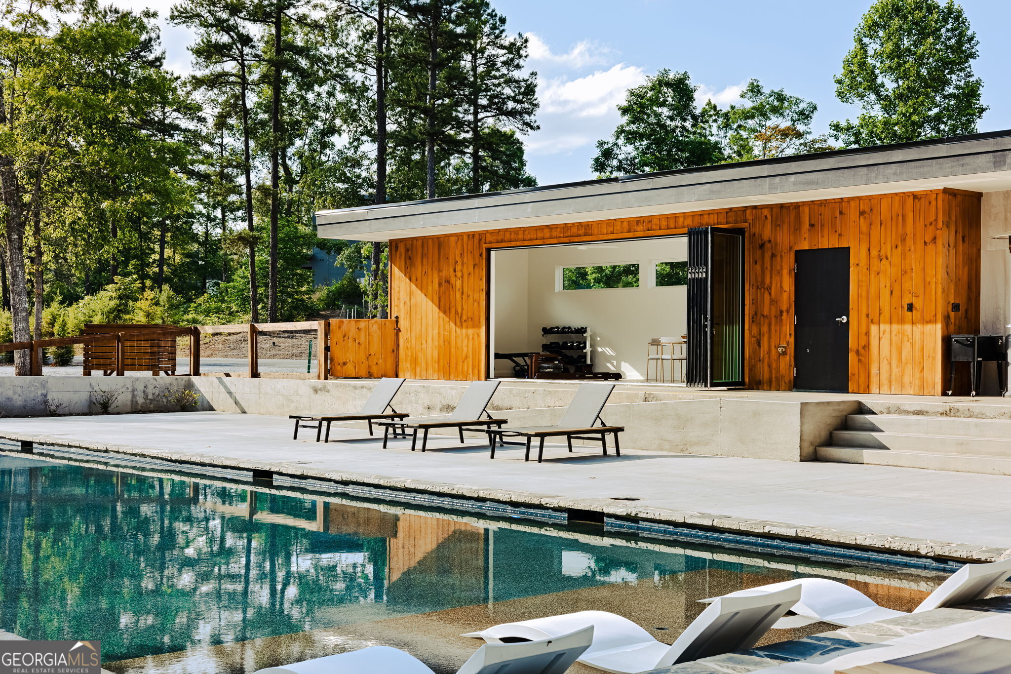 458 Brannon Ridge Young Harris, GA 30582 - Photo 2 of 34 swimming pool view with a seating space