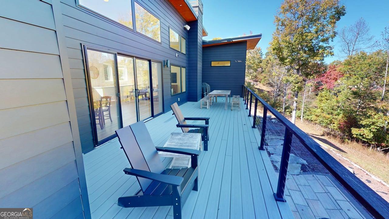 458 Brannon Ridge Young Harris, GA 30582 - Photo 22 of 34 a balcony view with a seating space