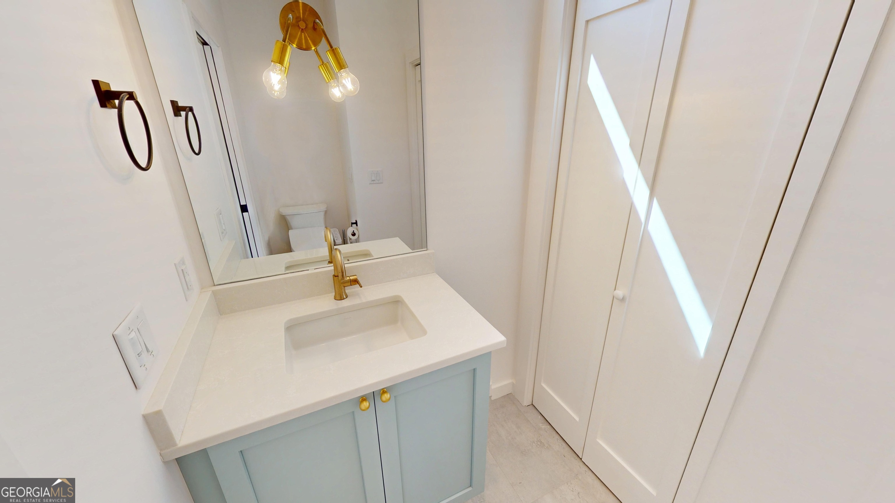 458 Brannon Ridge Young Harris, GA 30582 - Photo 23 of 34 a bathroom with a sink and mirror