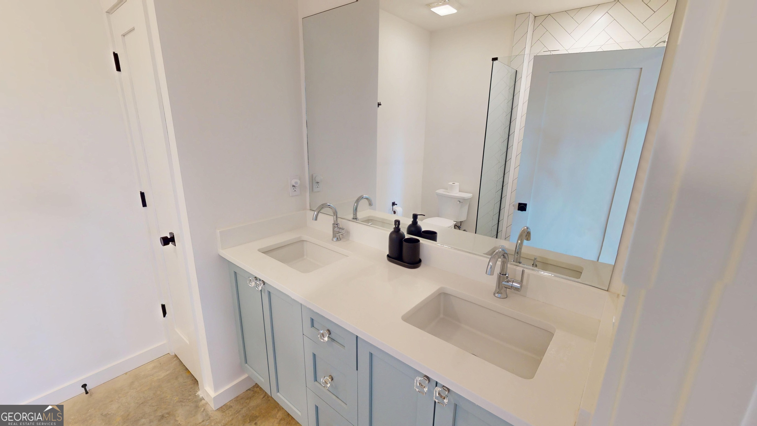 458 Brannon Ridge Young Harris, GA 30582 - Photo 25 of 34 a bathroom with a sink and a mirror