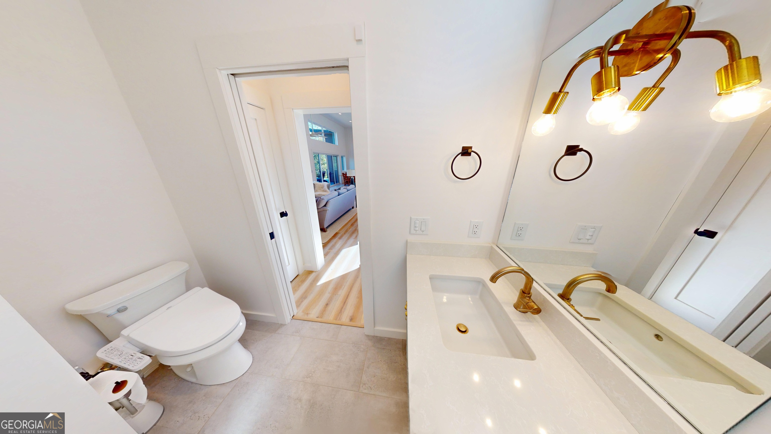 458 Brannon Ridge Young Harris, GA 30582 - Photo 26 of 34 a bathroom with a sink mirror vanity and toilet