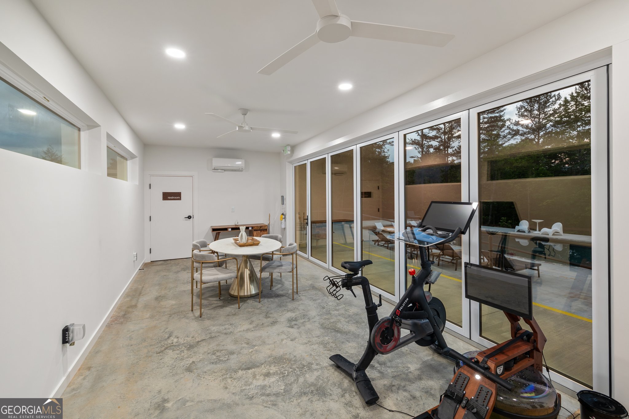 458 Brannon Ridge Young Harris, GA 30582 - Photo 27 of 34 a view of workspace with wooden floor windows and outdoor view