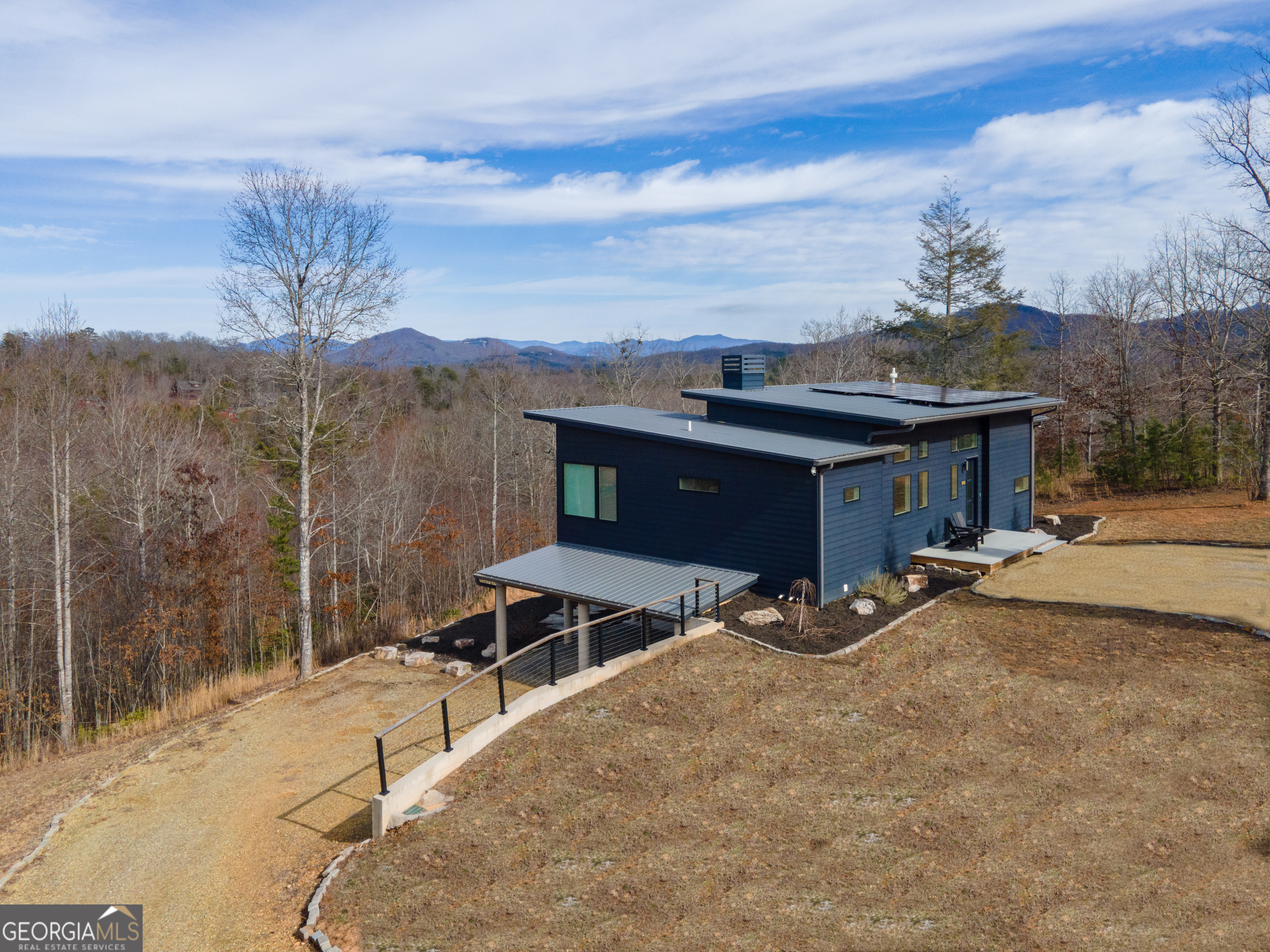 458 Brannon Ridge Young Harris, GA 30582 - Photo 34 of 34 a view of a terrace with a bed and sky view