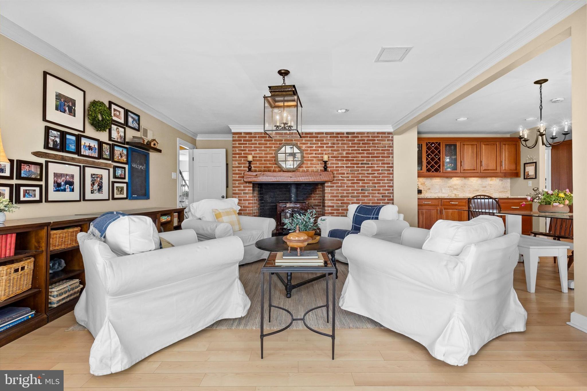 1979 Alcott Road York, PA 17402 - Photo 18 of 115 a living room with fireplace furniture and a wooden floor