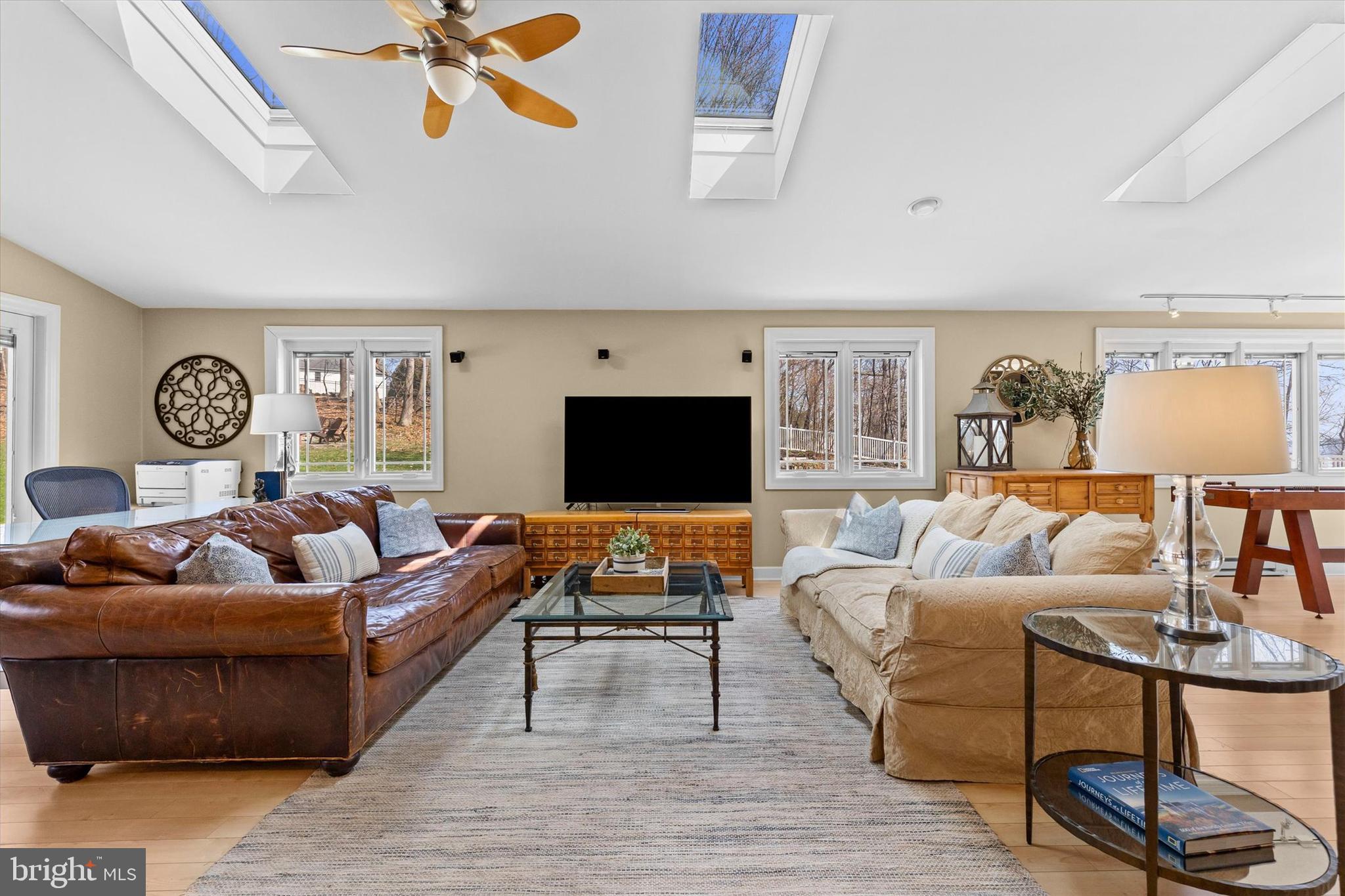 1979 Alcott Road York, PA 17402 - Photo 21 of 115 a living room with furniture and a flat screen tv with wooden floor